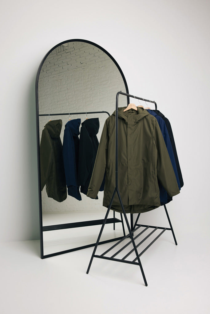 Load image into Gallery viewer, Iqoniq Thelon recycled polyester parka, textile with a hood and front zipper, in dark color, showing its casual winter design.