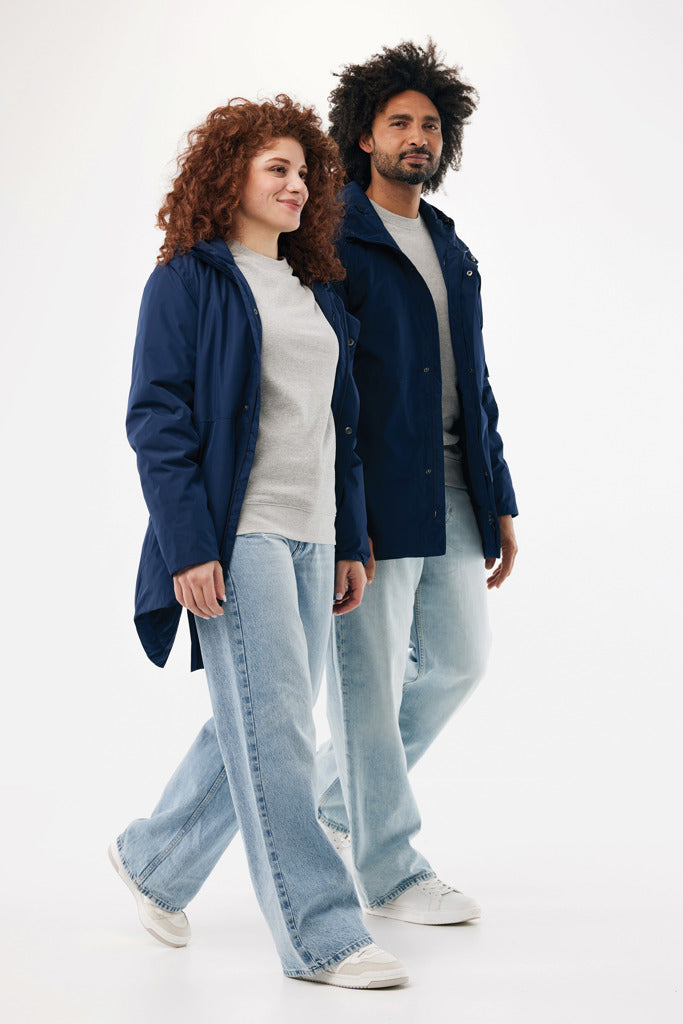 Load image into Gallery viewer, Iqoniq Thelon recycled polyester parka in textile fabric, showcasing its eco-friendly design and stylish fit.