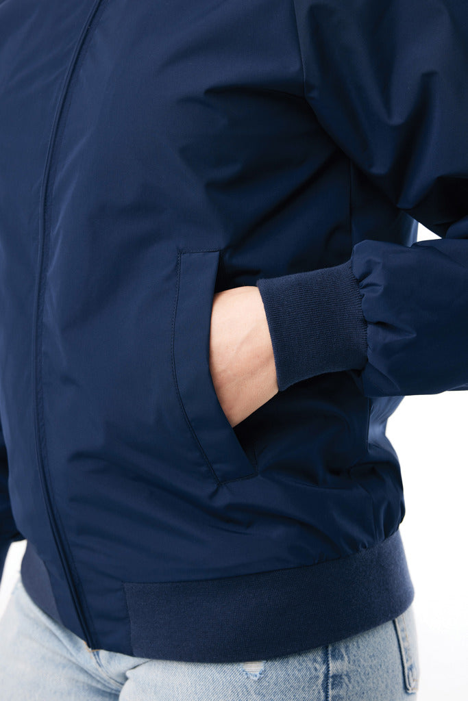 Load image into Gallery viewer, Iqoniq Odin recycled polyester urban jacket showing a sleek, modern textile design with a full front zipper and stylish collar.