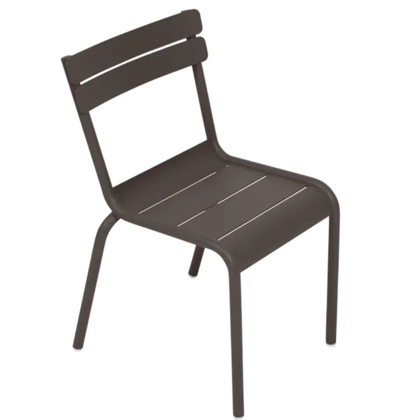 Load image into Gallery viewer, Fermob Luxembourg Kid Chair from Fermb Kids Corner Contract line, featuring colorful plastic seat and sturdy frame for children.