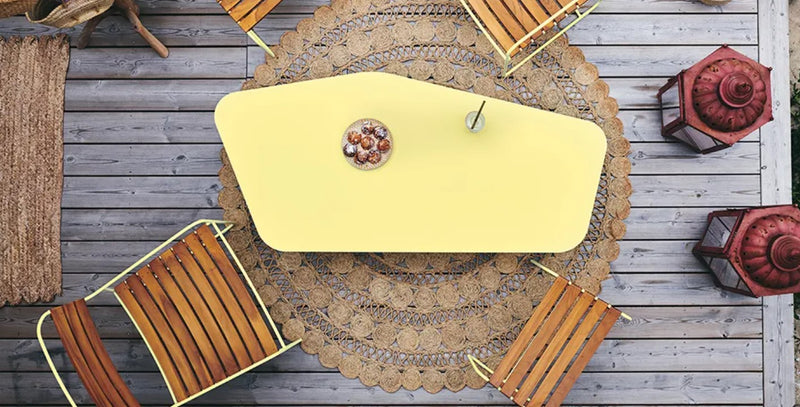 Load image into Gallery viewer, Fermob Ultrasofa low metal outdoor table, 162x74 cm, with a sleek modern design for patio or outdoor restaurant use.