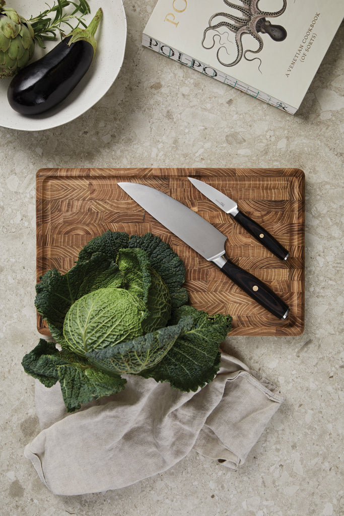 Load image into Gallery viewer, Vinga Tara steel chef's set for home and living, featuring stainless steel knives and utensils arranged on a kitchen countertop.