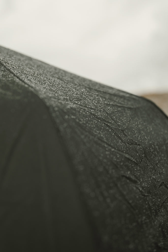 Load image into Gallery viewer, Vinga Baltimore AWARE™ RPET 21-inch umbrella opened, featuring eco-friendly design with a sturdy canopy and handle.
