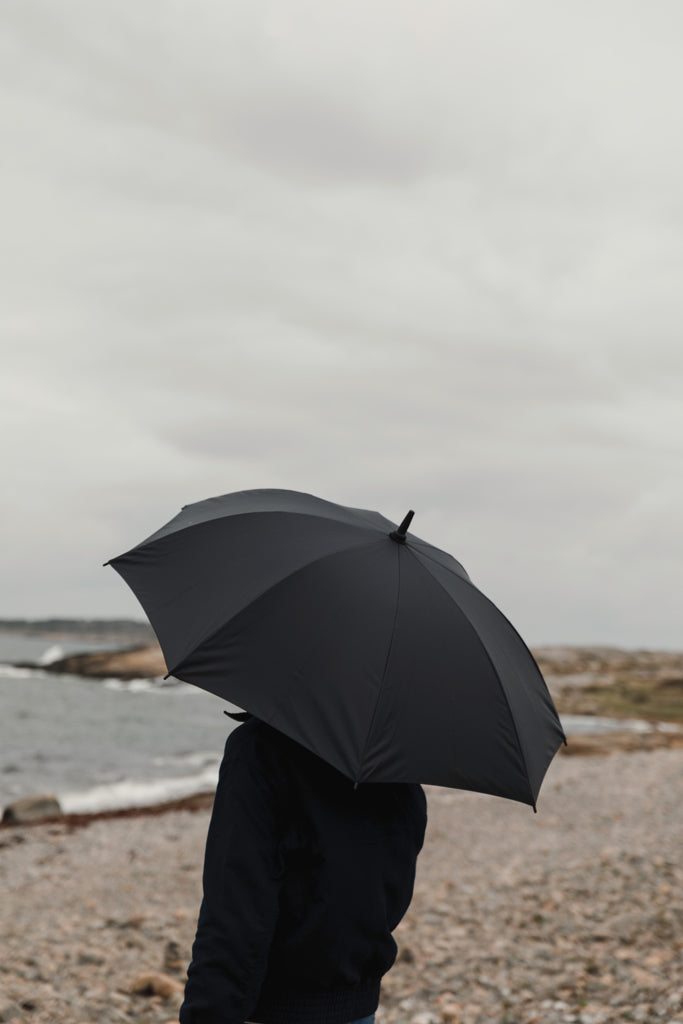 Load image into Gallery viewer, Vinga Baltimore AWARE™ RPET 23-inch umbrella open, navy blue canopy with Vinga logo, lightweight and eco-friendly outdoor umbrella