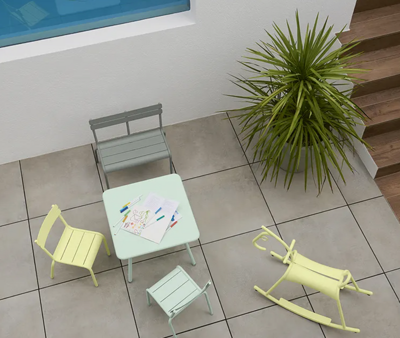 Load image into Gallery viewer, Fermob Luxembourg Kids Table in willow green and white, suitable for children’s play or dining area with a modern design.