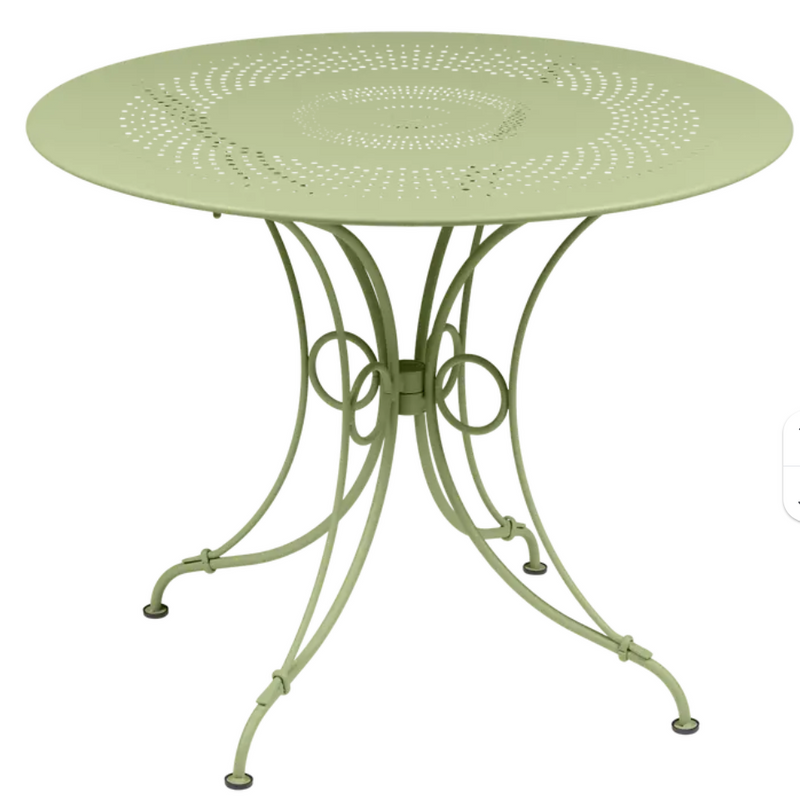 Load image into Gallery viewer, Fermob 1900 outdoor table with 96 cm diameter, featuring a sleek metal design and white finish, ideal for patio or garden.