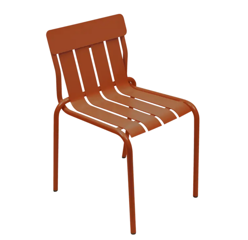 Load image into Gallery viewer, Fermob Stripe Chair outdoor dining stackable metal chair in vibrant orange, suitable for patio or hospitality settings.