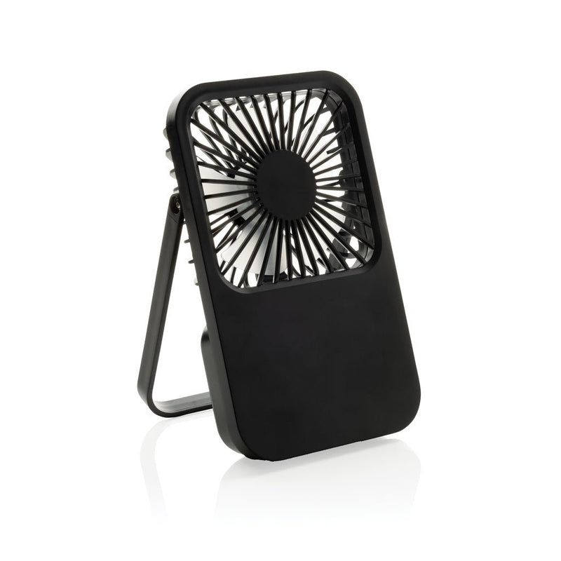 Load image into Gallery viewer, Aervina RCS recycled plastic re-chargeable desk fan - Custom Wood DesignsAervina RCS recycled plastic rechargeable desk fan by XD Collection, compact and eco-friendly, shown on a desk with electronic devices.Phone & Tablet accessoriesP457.0801Recycled ABSblack