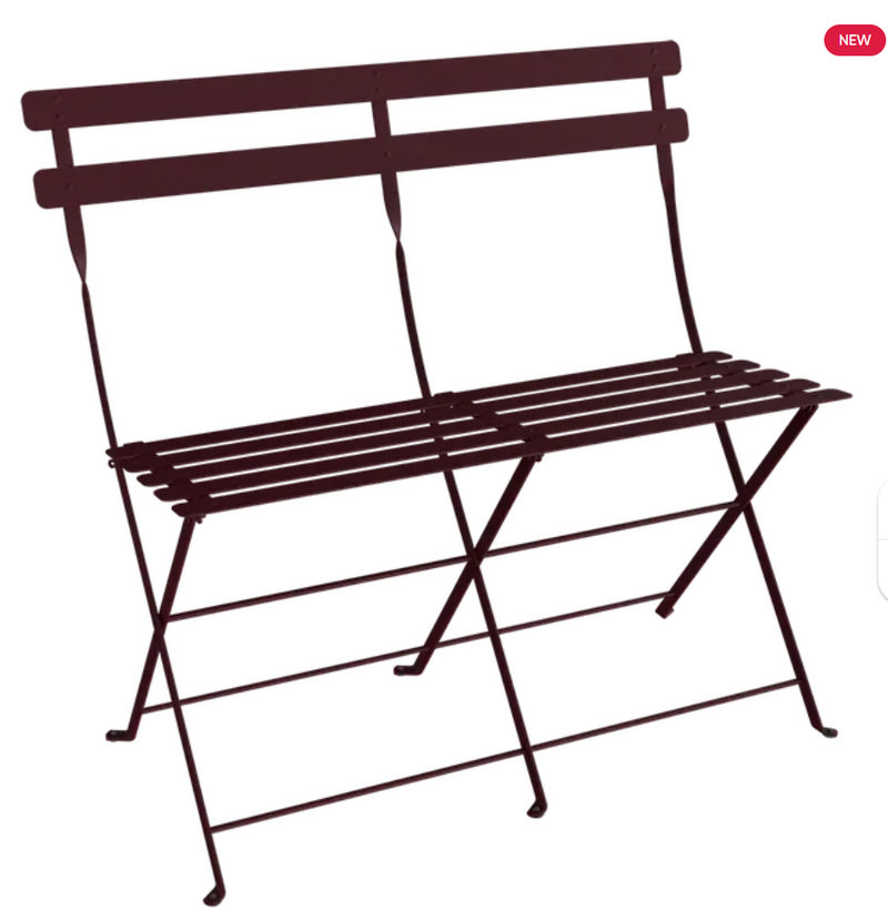 Load image into Gallery viewer, Black cherry Fermob Bistro Two Seater Ottoman, folding bench with cushioned seats, ideal for outdoor or patio use.