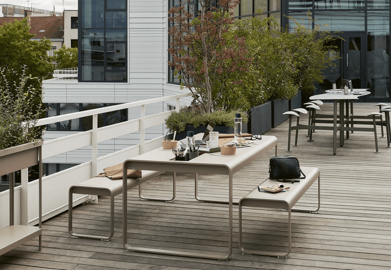 Load image into Gallery viewer, Fermob Bellevie outdoor dining table in wood and metal, 196x90 cm with storage, eight-seater for patio or garden.