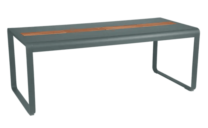 Load image into Gallery viewer, Storm grey Fermob Bellevie outdoor dining table with wood and metal design, featuring storage, seats eight comfortably.