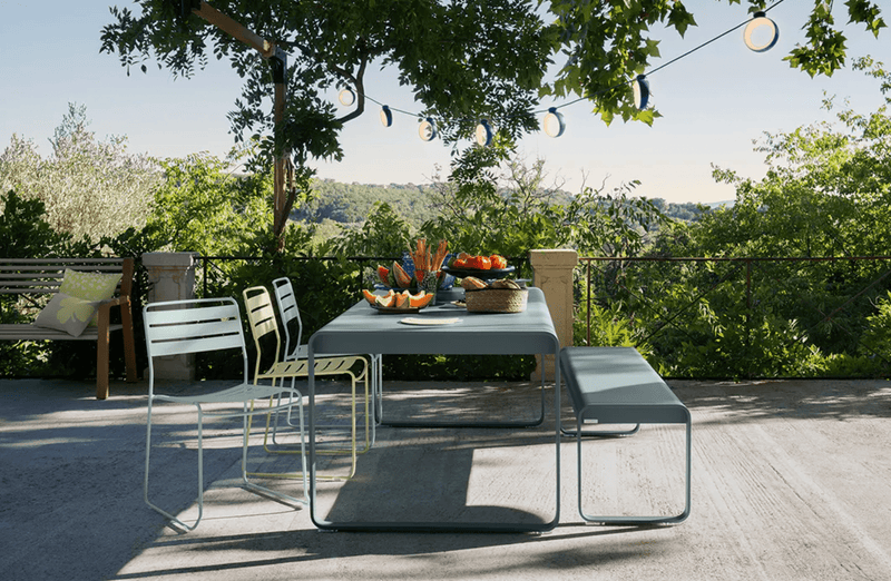 Load image into Gallery viewer, Fermob Bellevie outdoor metal dining table, 196 x 90 cm, eight-seater, with a sleek design and sturdy construction for outdoor use.