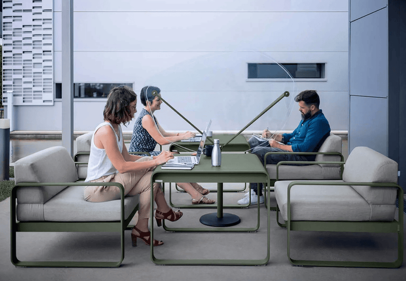 Load image into Gallery viewer, Fermob Bellevie armchair with metal frame and cushioned seat, stylish modern design for indoor or outdoor use.