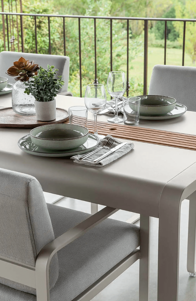Load image into Gallery viewer, Outdoor Fermob BELLEVIE Dining Armchair in Nutmeg Grey Toupe with a woven seat and armrests, designed for comfortable outdoor dining.