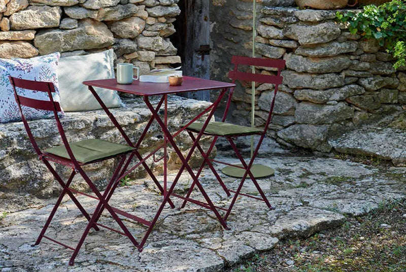 Load image into Gallery viewer, Bistro Table 71x71cm - Custom Wood DesignsFermob foldable metal bistro table measuring 57x57 inches with powder-coated finish, ideal for restaurant and hospitality settings.Foldable Table Ferob Outdoor7929.0Cedar Green