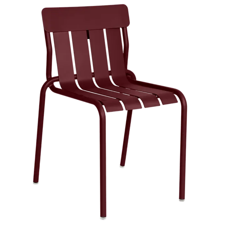 Load image into Gallery viewer, Black Fermob Stripe Stackable Outdoor Dining Chair, metal design, suitable for outdoor dining and hospitality settings.