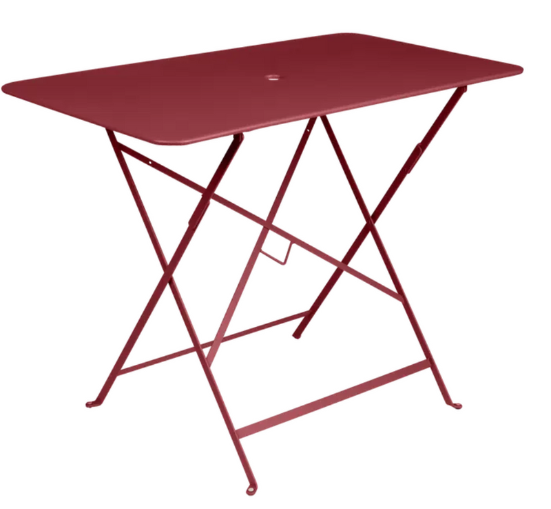 Load image into Gallery viewer, Red Fermob metal foldable bistro table, 97x57 cm, outdoor cafe style with honey finish and lightweight design.