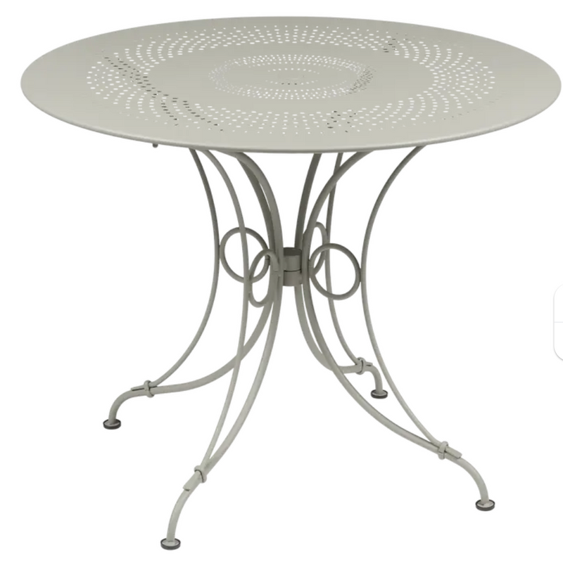 Load image into Gallery viewer, Fermob 1900 outdoor table with 96cm diameter, round clay-colored metal table for garden or patio seating.