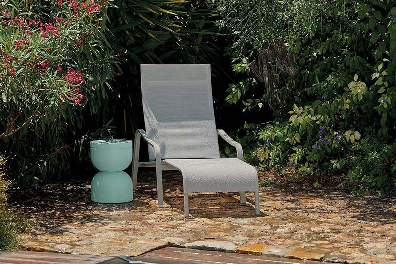 Load image into Gallery viewer, Fermob Alizé outdoor furniture in a garden setting