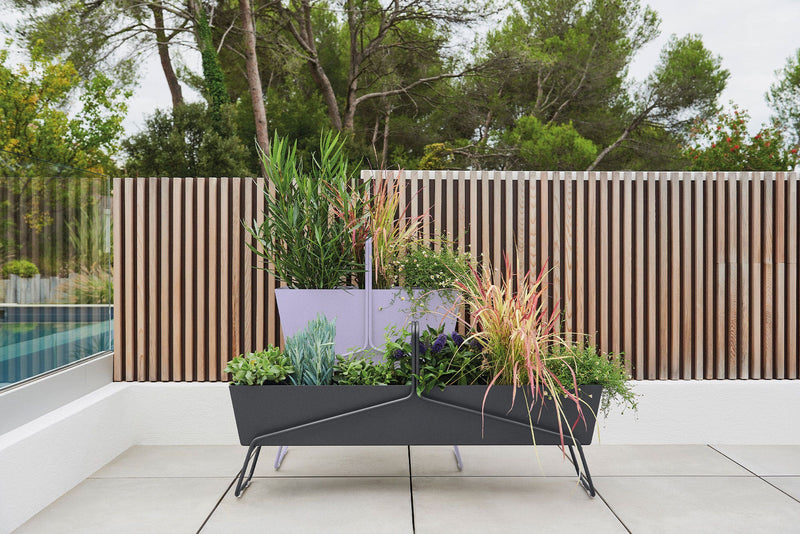 Load image into Gallery viewer, Fermob Basket outdoor furniture in a garden setting