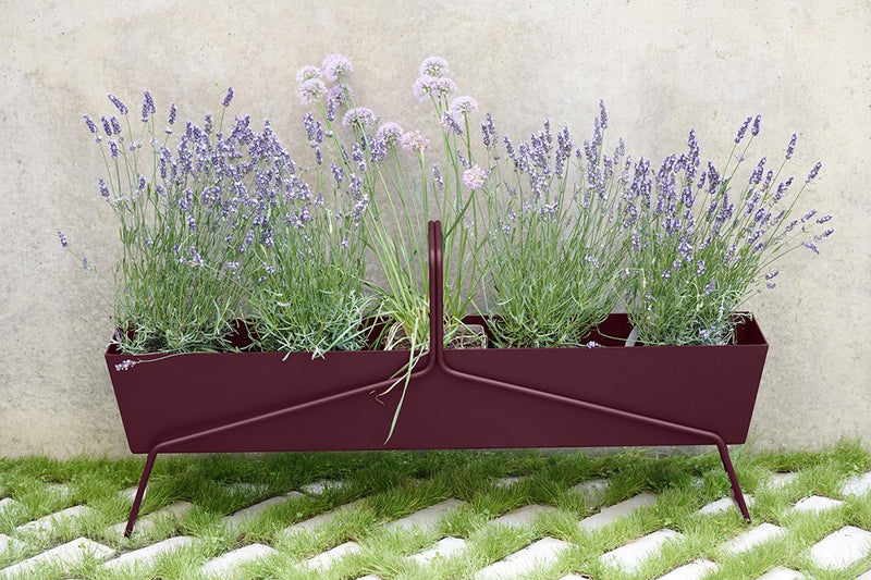 Load image into Gallery viewer, Fermob Basket outdoor furniture in a garden setting