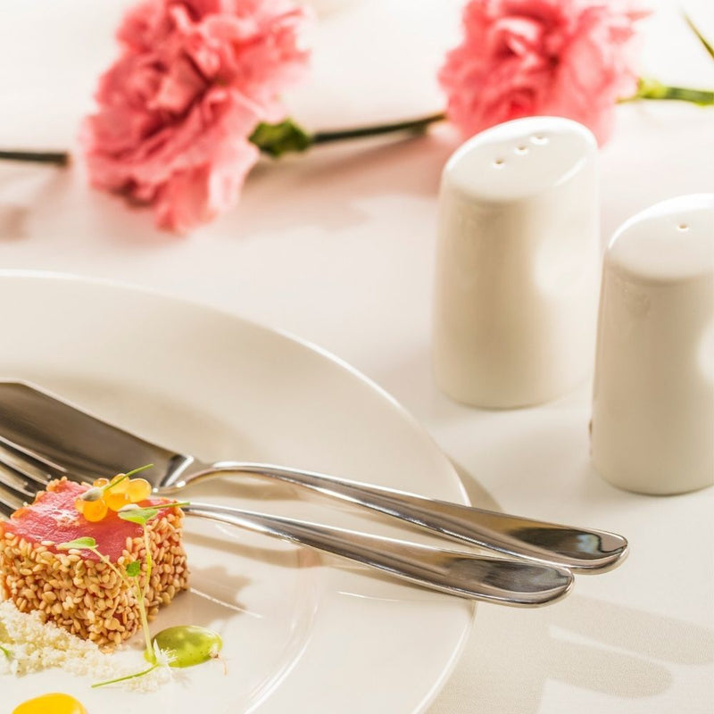 Load image into Gallery viewer, Fine Dine Crema pepper shaker, 50x70mm, with a sleek cream-colored design and metal top for easy seasoning.