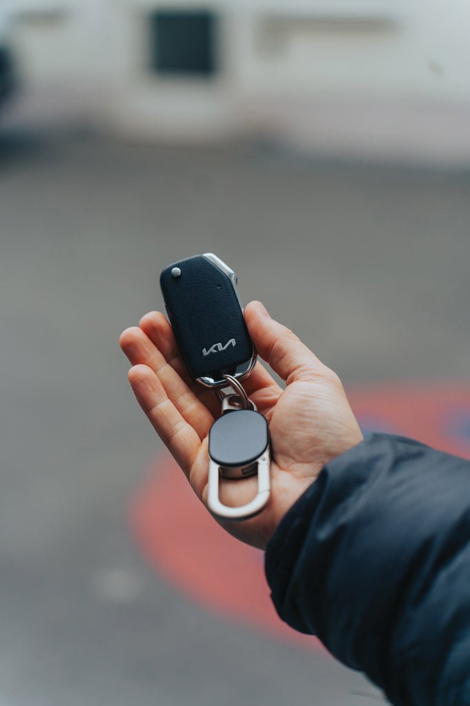 Load image into Gallery viewer, XD Collection dual keyfinder keychain with worldwide location tracking, featuring custom wood design and zinc alloy accents.