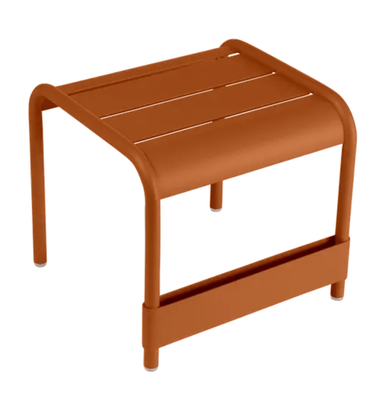 Load image into Gallery viewer, Fermob Luxembourg small low table or footrest in Candied Orange color, measuring 44x42 cm, with a modern outdoor design