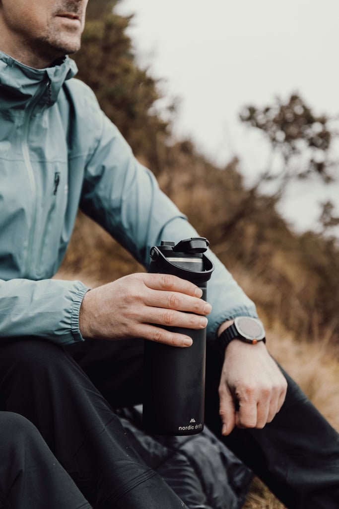 Load image into Gallery viewer, Nordic Drift Trail RCS Insulated sports bottle 940ml - Custom Wood DesignsNordic Drift insulated sports bottle 940ml in black with a screw-top lid, designed for cold and hot beverages during sports activities.DrinkwareND310.0001Recycled Stainless steel,Polypropyleneblack