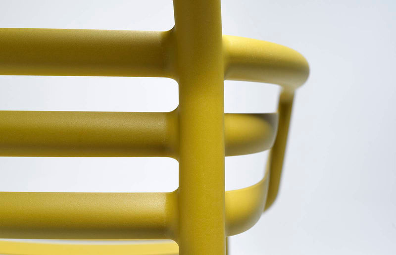 Load image into Gallery viewer, Nardi Doga outdoor armchair with woven rattan-style design and curved armrests, perfect for outdoor patio seating.