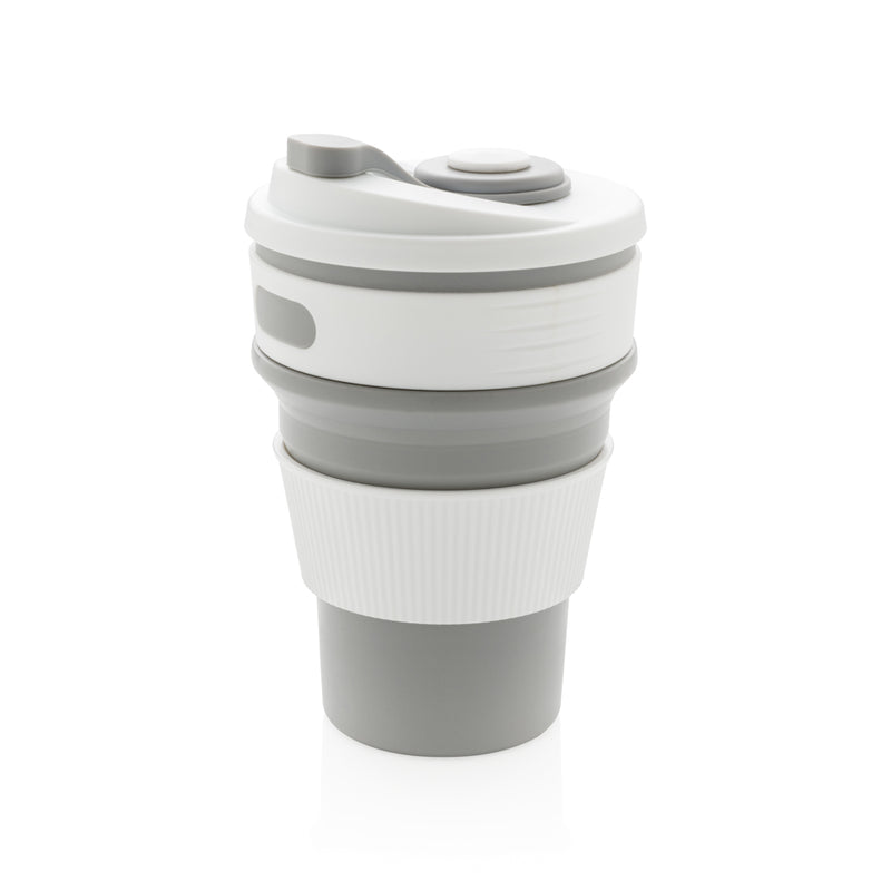 Load image into Gallery viewer, Foldable silicone drinkware cup by XD Collection, showing the portable, flexible silicone material and compact design.