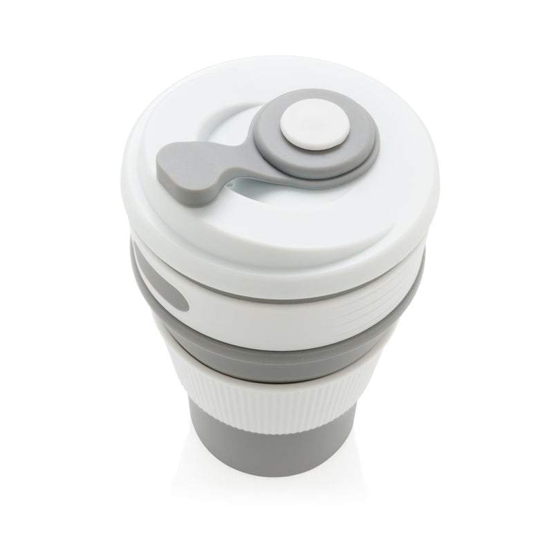 Load image into Gallery viewer, Foldable silicone drinkware cup from XD Collection, showing its flexible design and bright color on a white background.