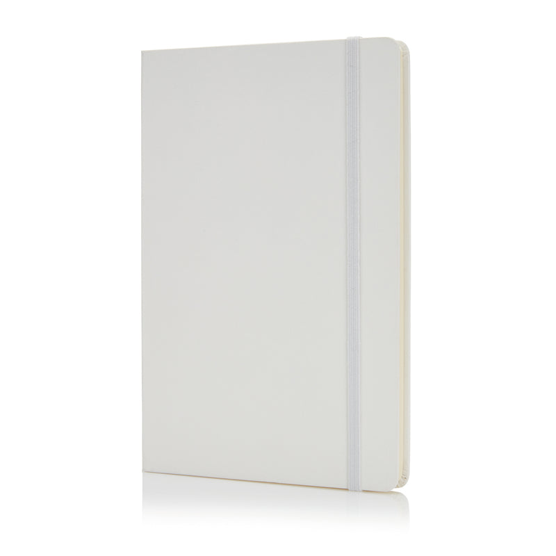 Load image into Gallery viewer, Deluxe hardcover A5 notebook from XD Collection with a sleek black cover and gold-embossed logo, open to reveal lined pages.
