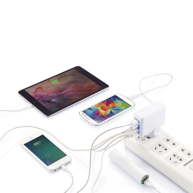 Load image into Gallery viewer, XD Collection travel plug with 4 USB ports for charging phones and tablets, compact and portable accessory for travel.
