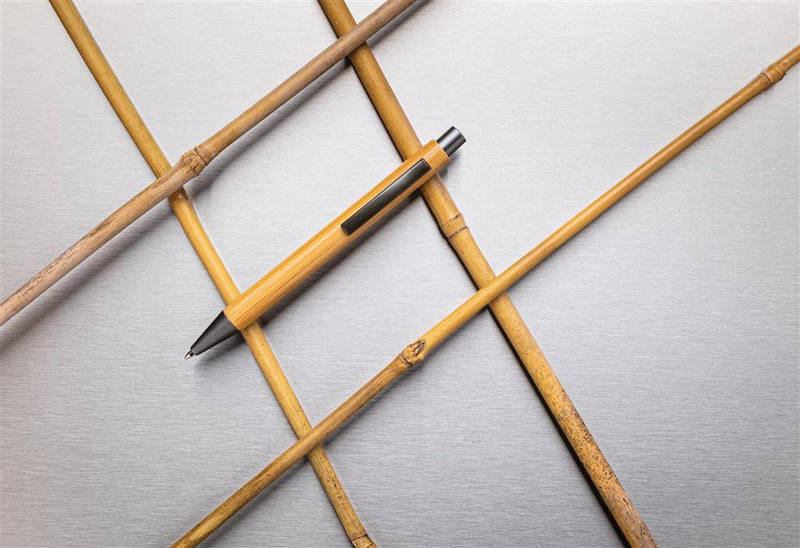 Load image into Gallery viewer, Slim bamboo pens from Custom Wood Designs, pack of 500, featuring natural bamboo barrels and black ink tips.