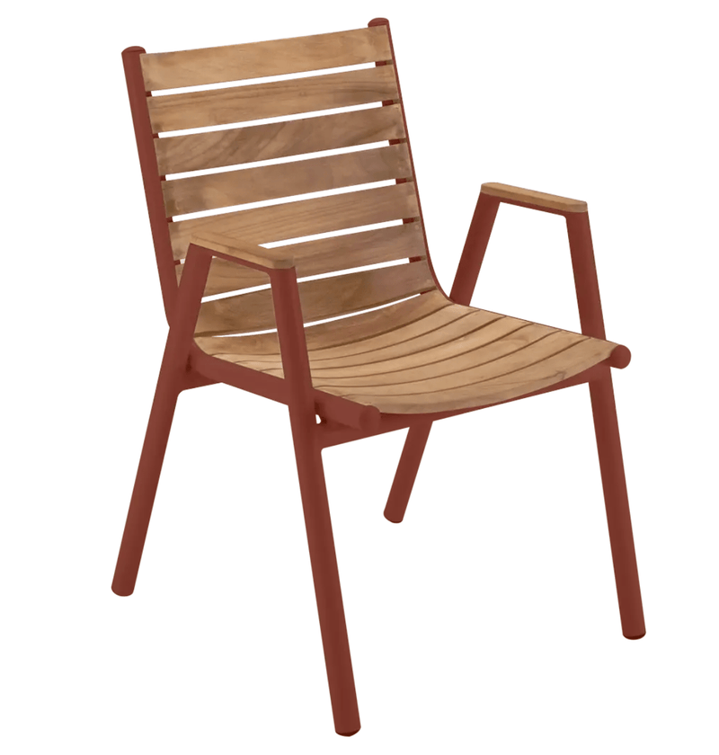 Load image into Gallery viewer, Red ochre Fermob Pilotis teak armchair with curved armrests and slatted design, perfect for outdoor seating.
