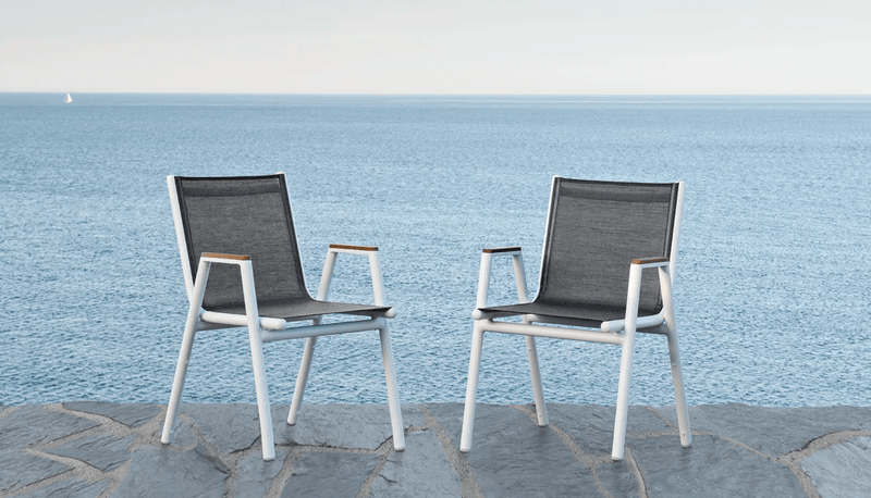 Load image into Gallery viewer, Pilotis V Batyline Armchair Teak - Custom Wood DesignsFermob Pilotis V Batyline teak armchair with woven Batyline fabric and teak wood frame, suitable for outdoor restaurant or hotel use.Teak Batyline Armchair24575194742039