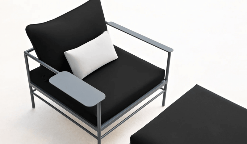 Load image into Gallery viewer, Rivage Ottoman - Custom Wood DesignsFermob Rivage Ottoman outdoor furniture with metal frame and fabric cover, shown on a shelf in an outdoor settingOttoman Outdoor Furniture Fermob Metal24575201360023Rosemary Twine