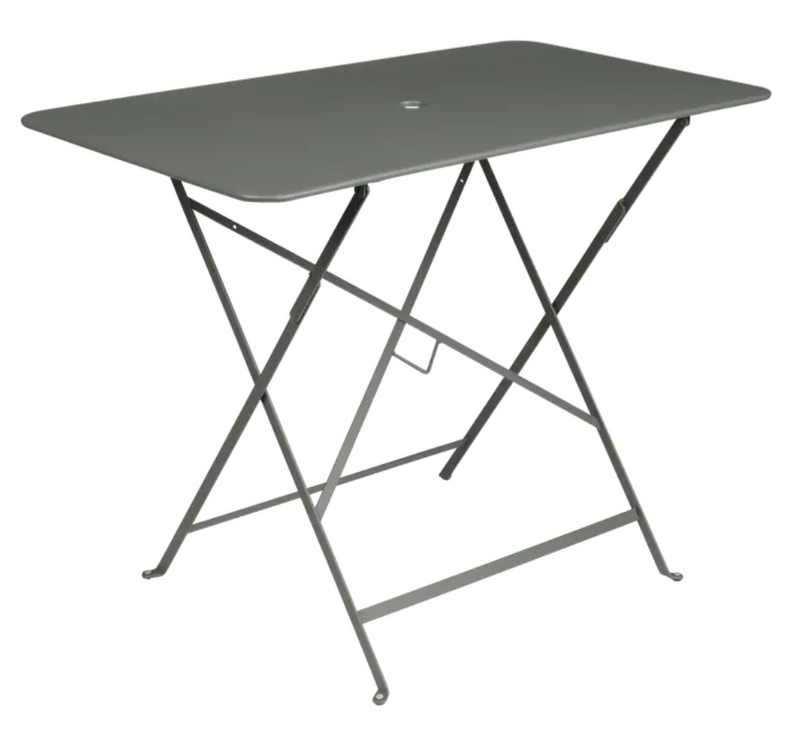 Load image into Gallery viewer, Fermob metal foldable bistro table measuring 97x57 cm in muted green, ideal for outdoor café or patio seating for four.