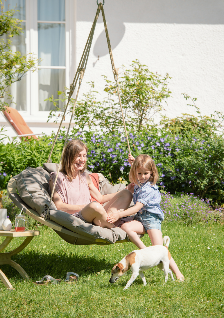 Load image into Gallery viewer, Swing Nest Taupe – Premium Wooden Hanging Chair - Custom Wood DesignsTaupe wooden swing nest chair by Custom Wood Designs, hanging from a sturdy frame, featuring a cozy woven seat and backrest.Swing Chair24575225754519