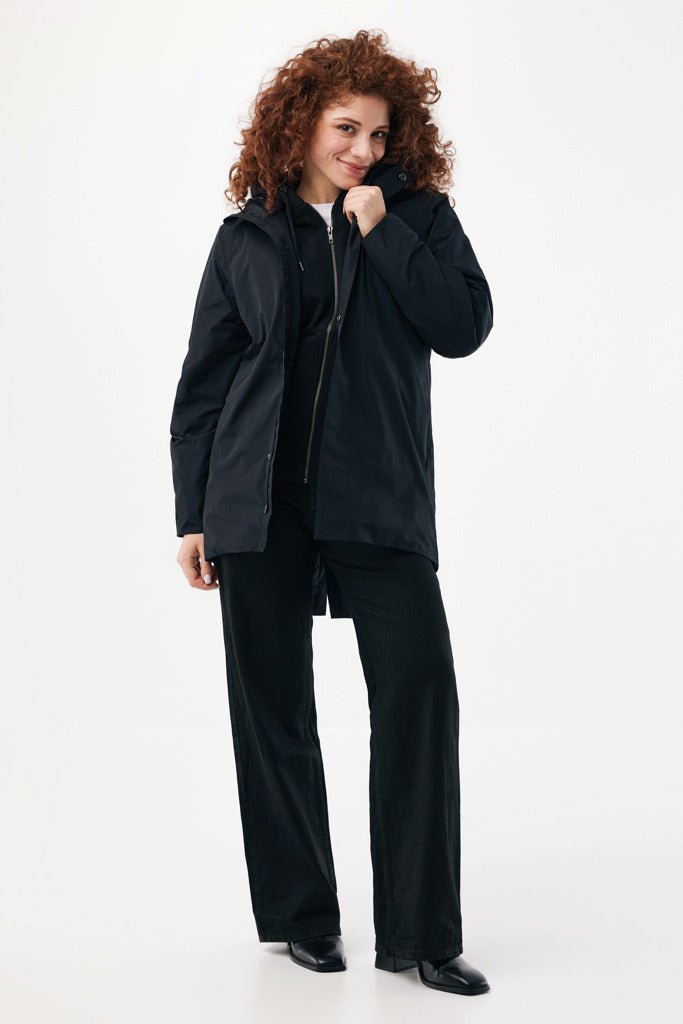 Load image into Gallery viewer, iqoniq Thelon recycled polyester parka in black with custom wood design, showcasing a stylish, eco-friendly textile outerwear.