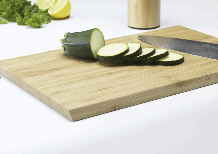 Load image into Gallery viewer, Set of 25 bamboo cutting boards from Custom Wood Designs, durable and eco-friendly for kitchen food prep.