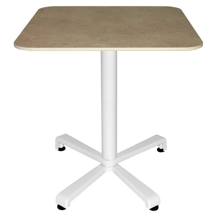 Fermob Sydney bistro table with cotton white base and stone effect top on a garden patio