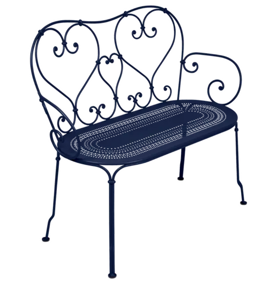 Deep blue Fermob 1900 decorative bench with sleek, minimalist design and metal frame, perfect for indoor or outdoor use.