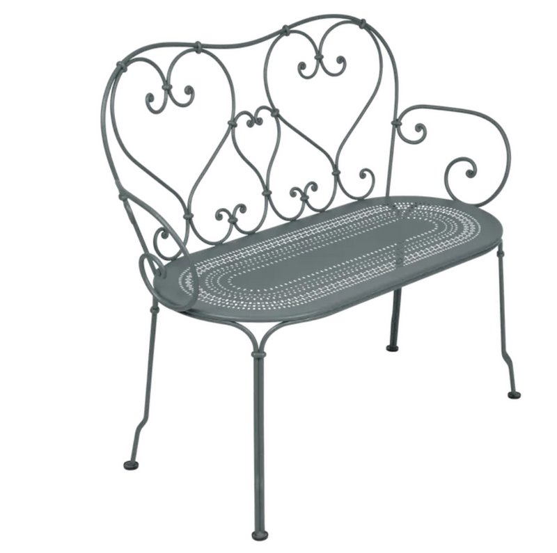 Load image into Gallery viewer, Fermob 1900 decorative bench with a sleek metal design in Storm color, perfect for indoor or outdoor seating.
