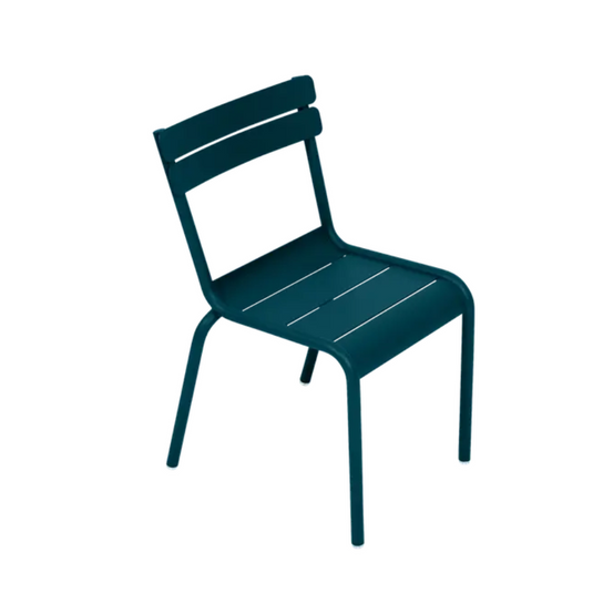 Fermob Luxembourg Kid Chair from Fermb Kids Corner Contract, featuring colorful, sturdy plastic seating for children.