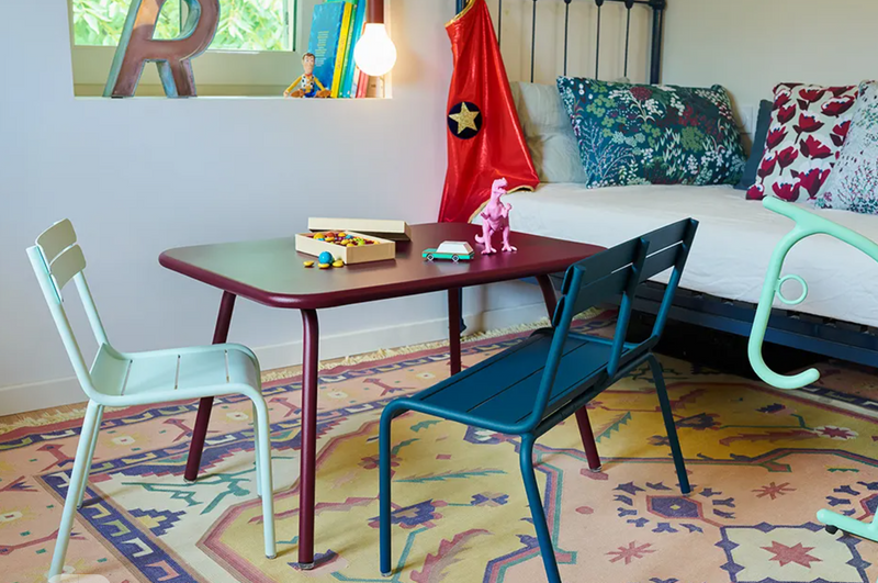 Load image into Gallery viewer, White Fermob ADADA rocking horse for kids' restaurant corner, lightweight wooden toy with a smooth finish for children.
