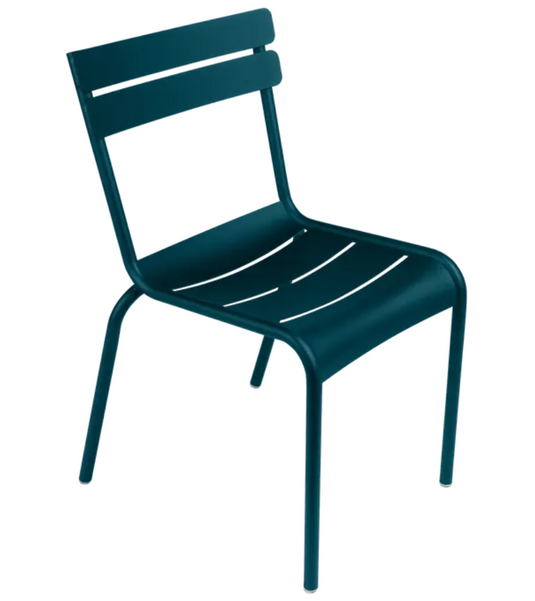 Fermob Luxembourg armchair with metal frame, stackable design, suitable for outdoor or restaurant seating, featuring a modern style.