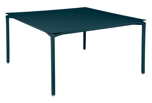 Fermob CALVI square dining table, 140x140 cm, metal tabletop with eight seats, modern outdoor furniture design.