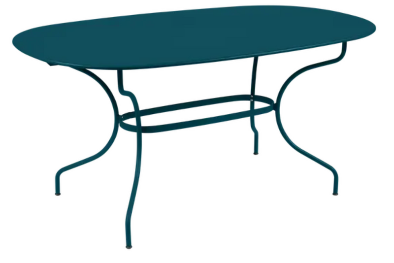 Load image into Gallery viewer, Fermob OPÉRA+ oval metal outdoor table in Acapulco Blue, 160 x 90 cm, six-seater outdoor dining table.
